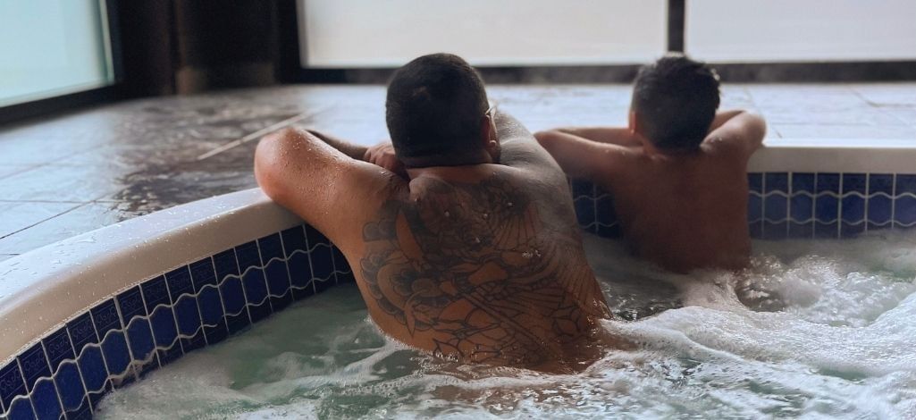 Guests relaxing in a hot tub during a Whistler spa getaway