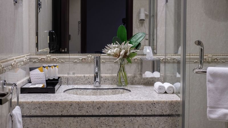 Vanity area with various toiletries in Junior Suite Sea View at Warwick Hotels & Resorts