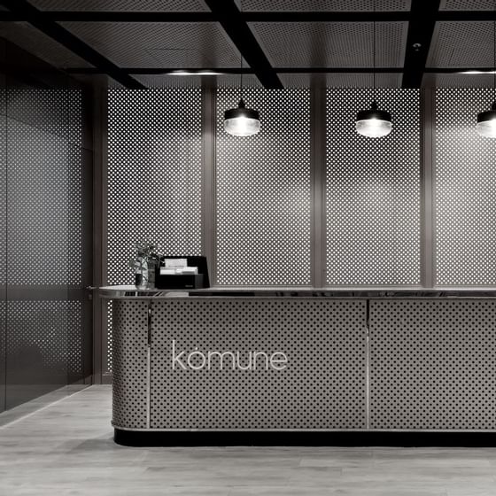 Dark themed portrait of hotel reception at VE Hotel & Residence