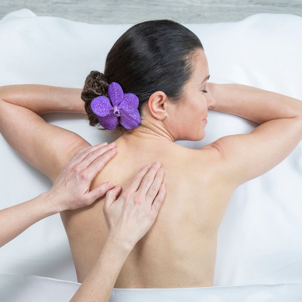 Lady getting a massage at Falkensteiner Hotels