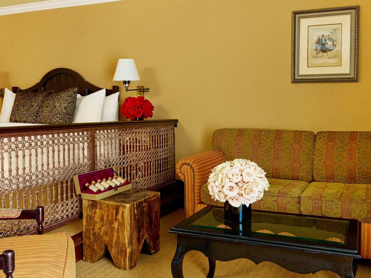 Junior King Suite, where to stay in Los Angeles classic wooden desk and an antique mirror at Petit Ermitage