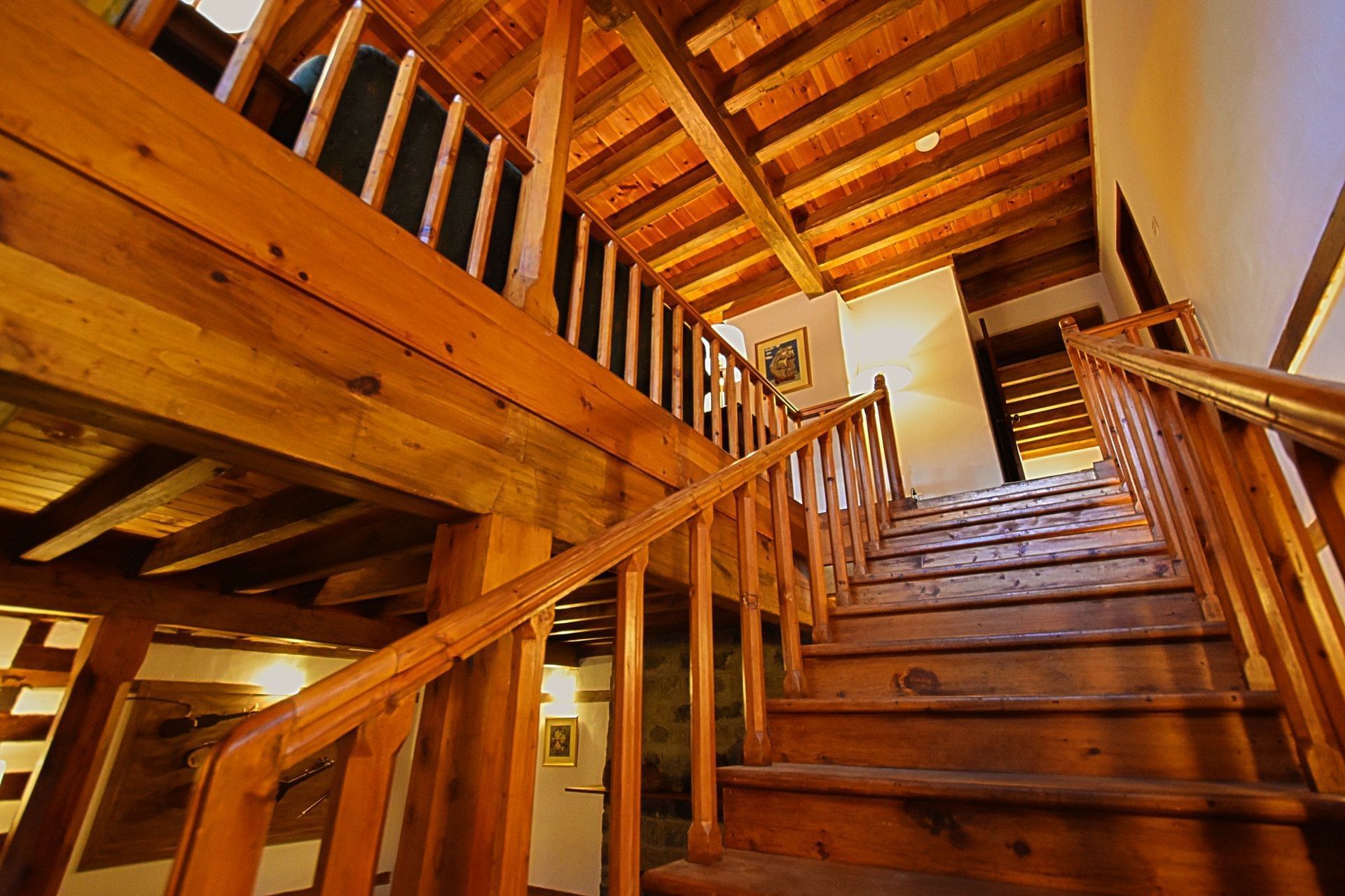 Wooden stairway with handrails at Serena Altit Fort