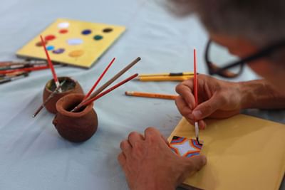 Closeup of a Man painting a picture at Punta Islita Hotel