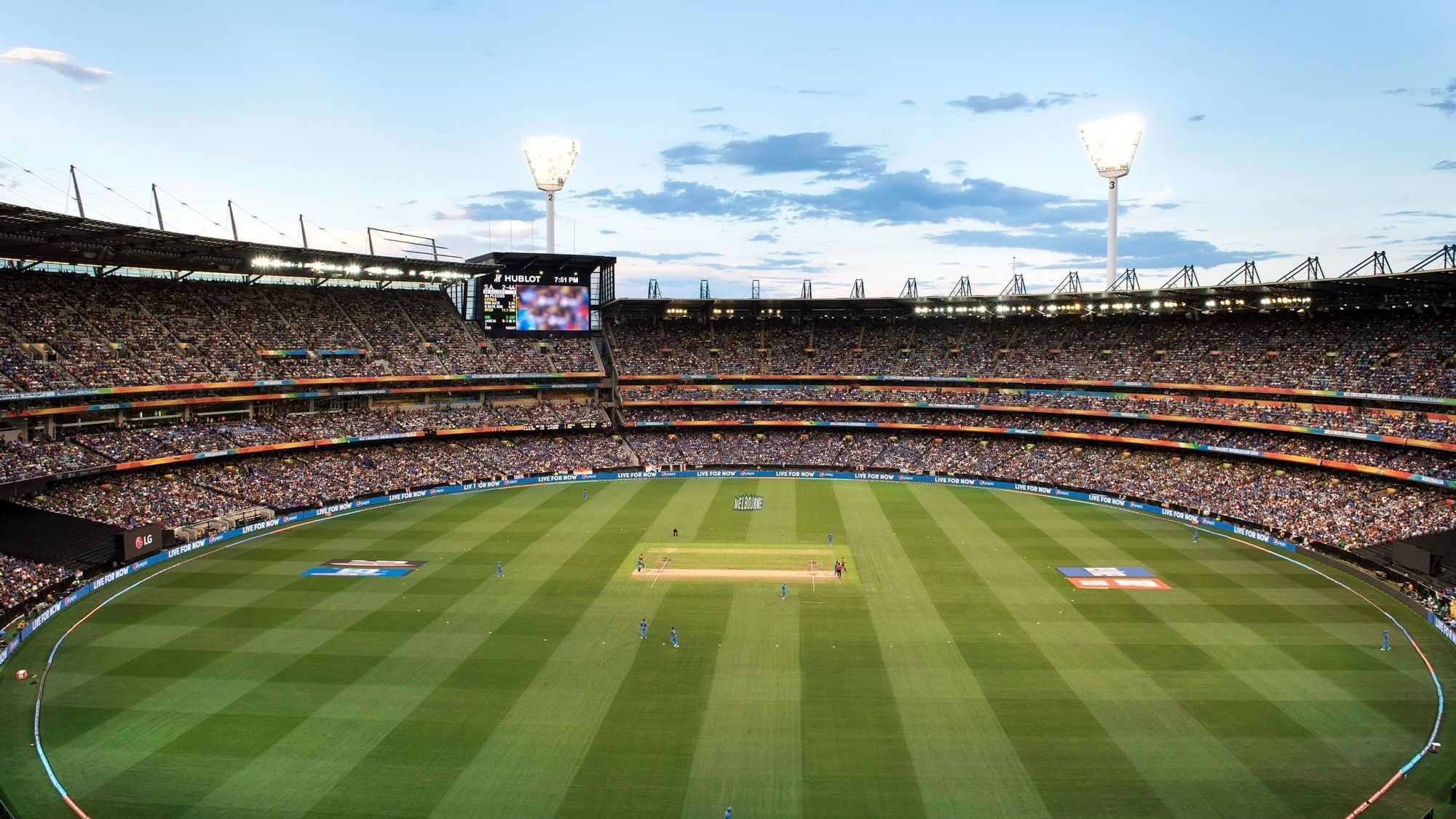 Distant view of the crowed Melbourne Cricket Ground near Quay West Suites Melbourne