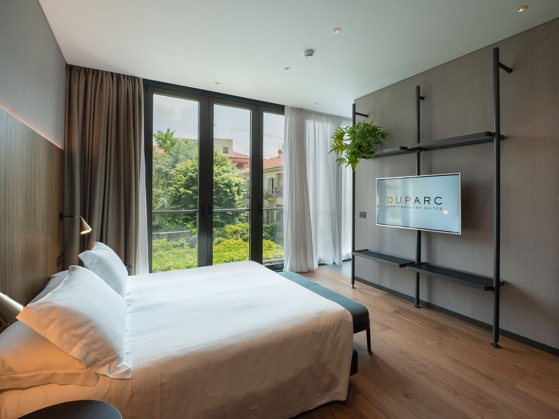 Bed in Luxury Double Junior Suite at Duparc Contemporary Suites