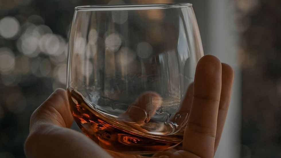 Holding a whisky glass, Whisky distillery, Falkensteiner Hotels