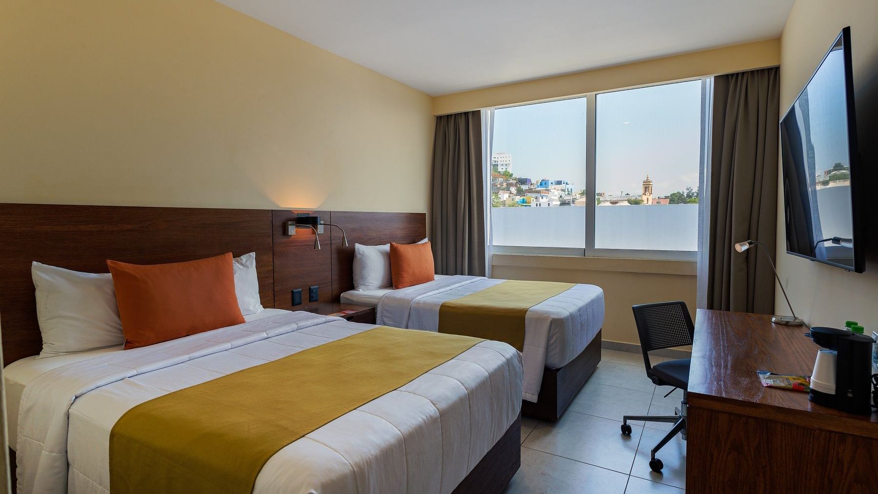 Bedroom arrangement in Superior double at Gamma Hotels