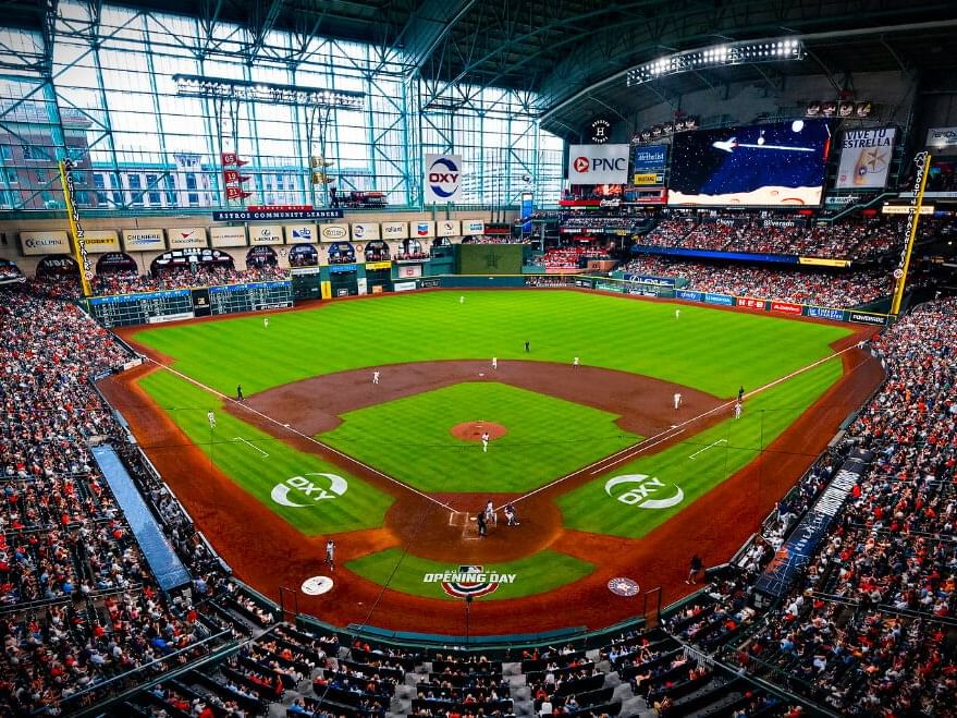 Daikin Park’s bustling baseball stadium near Granduca Houston, a top spot for things to do in Houston