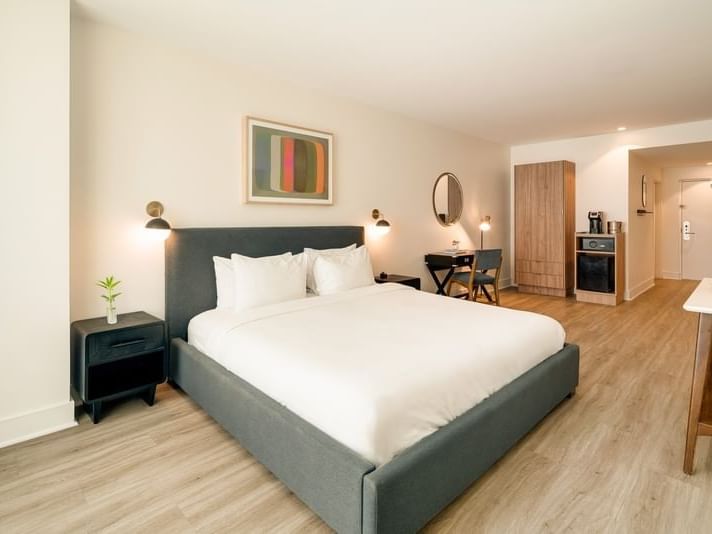 Superior King with a bed, private work desk, and minibar cabinet at Kenmore Village Hotel, hotels in Miami Beach south