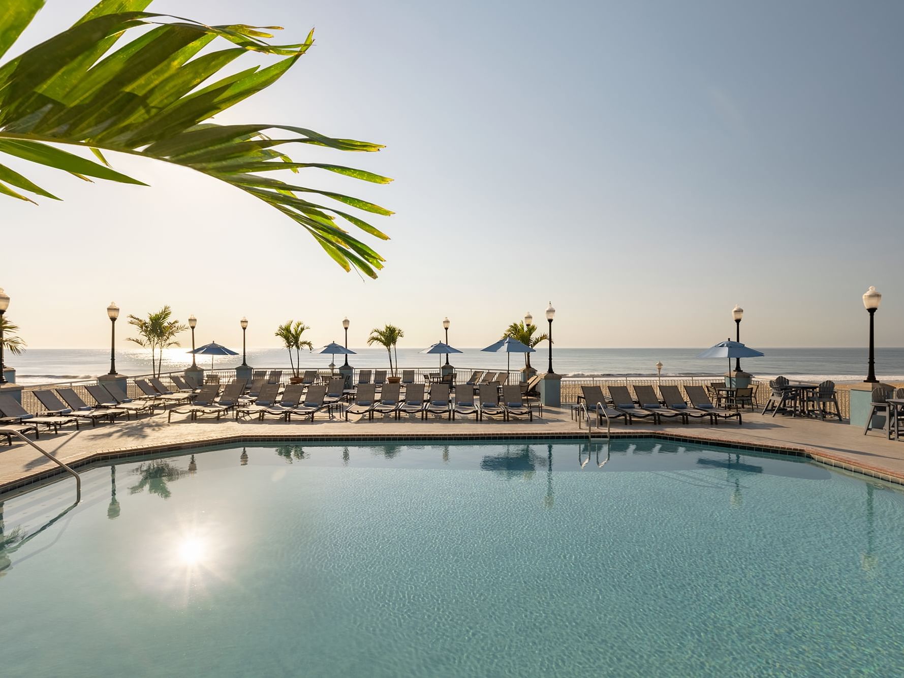 Close-up of the pool and lounges at Holiday Inn Hotel & Suites