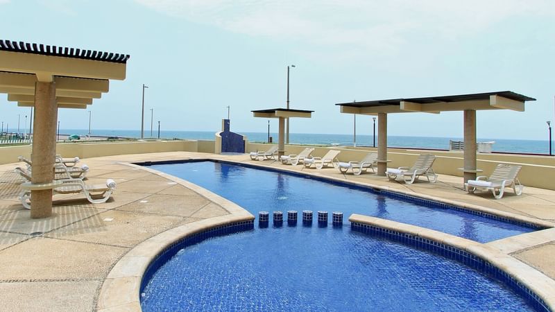 Outdoor swimming pool area at Fiesta Inn Coatzacoalcos