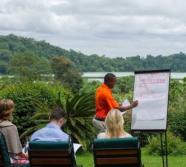 A person giving Swahili Lessons at Arusha Serena Hotels