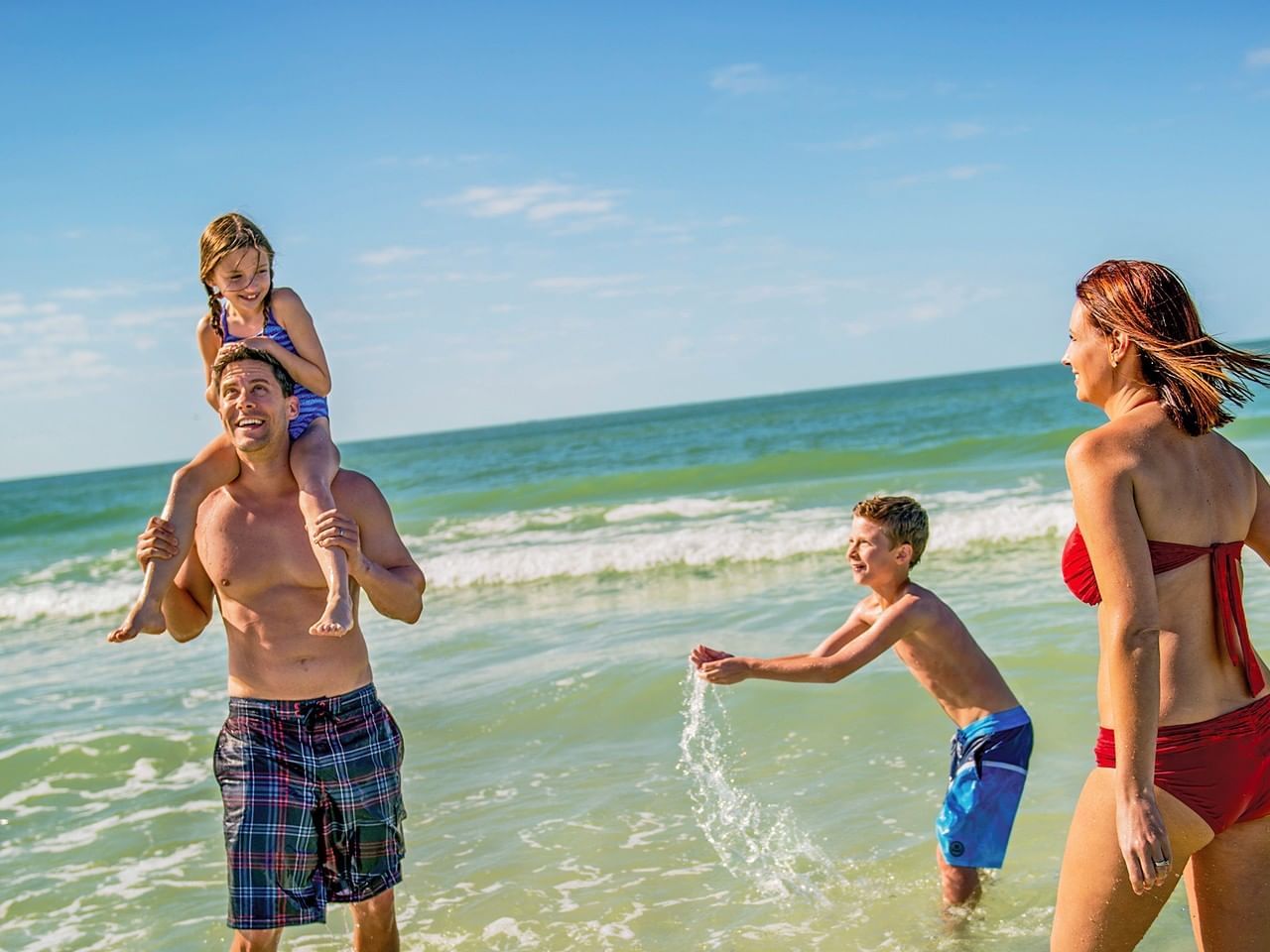 Family playing in Coronado beach