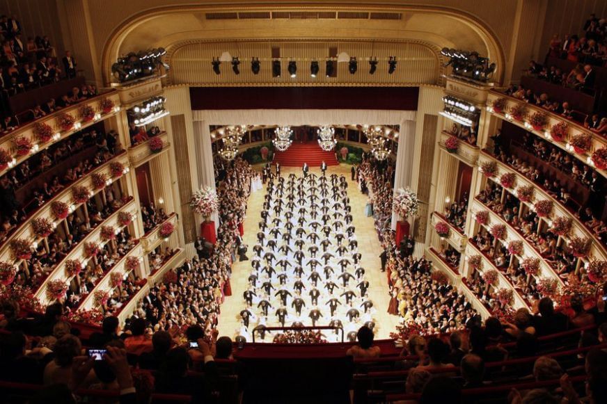 Vienna State Opera with ballet performance, audience, opera boxes and festive auditorium decoration