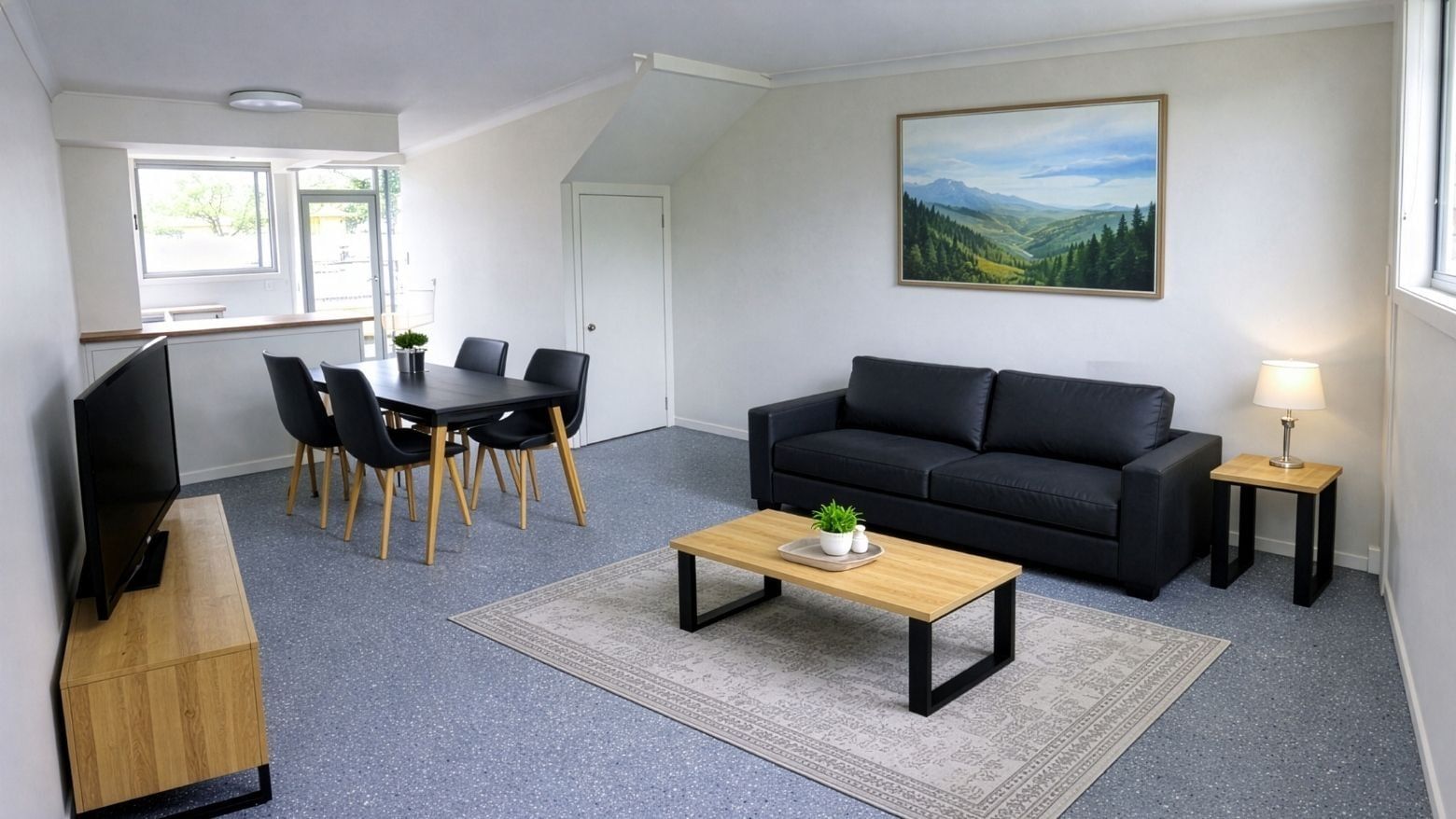 Living room with couch, coffee table, dining set, and TV at UniLodge SCU Lismore - Sirius.