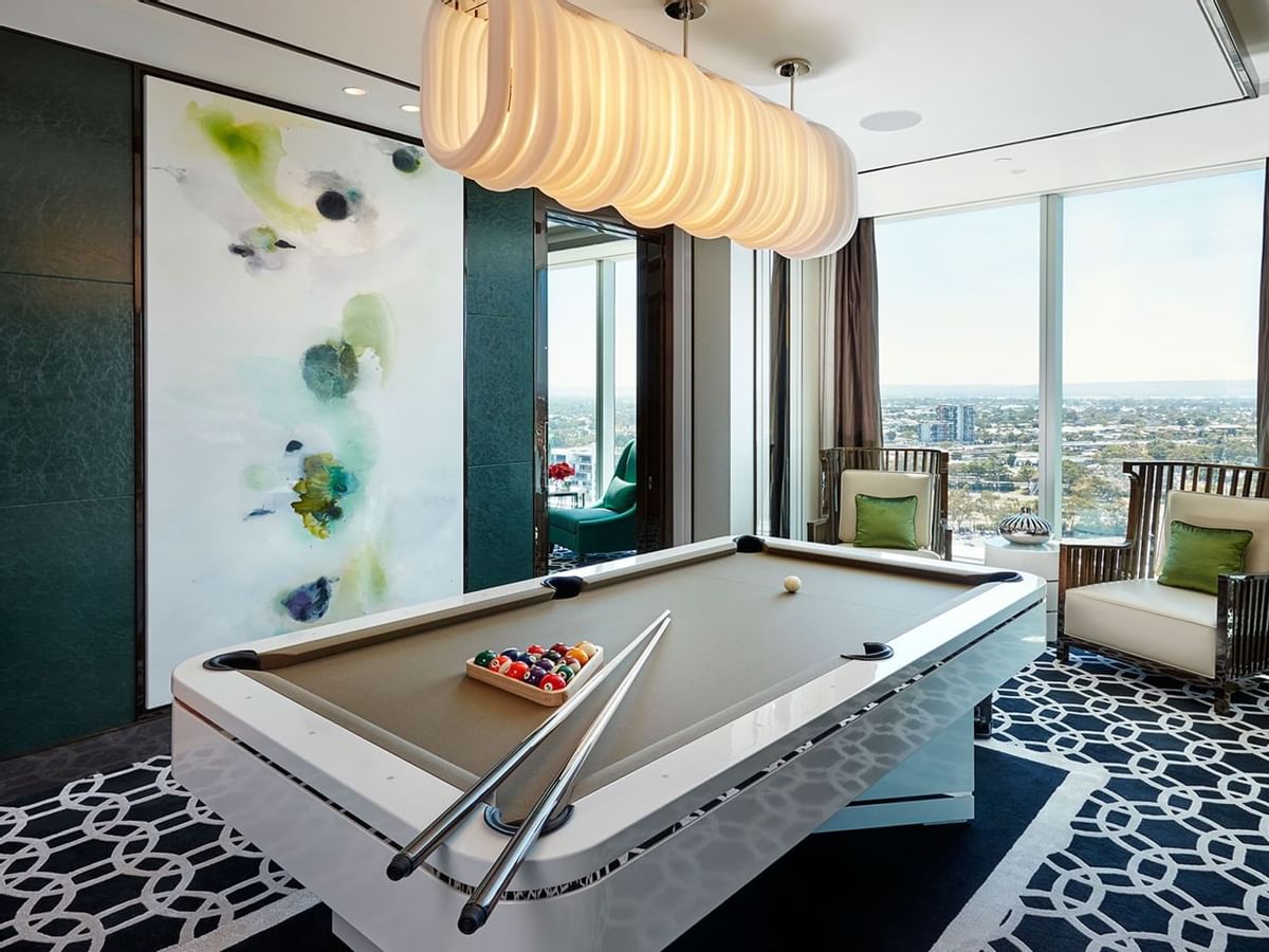 A pool table and relaxation area at Crown Hotel Perth