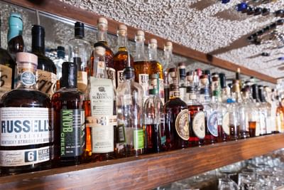 Liquor bottles in The Clocktower Cellar at Alpenhof Lodge