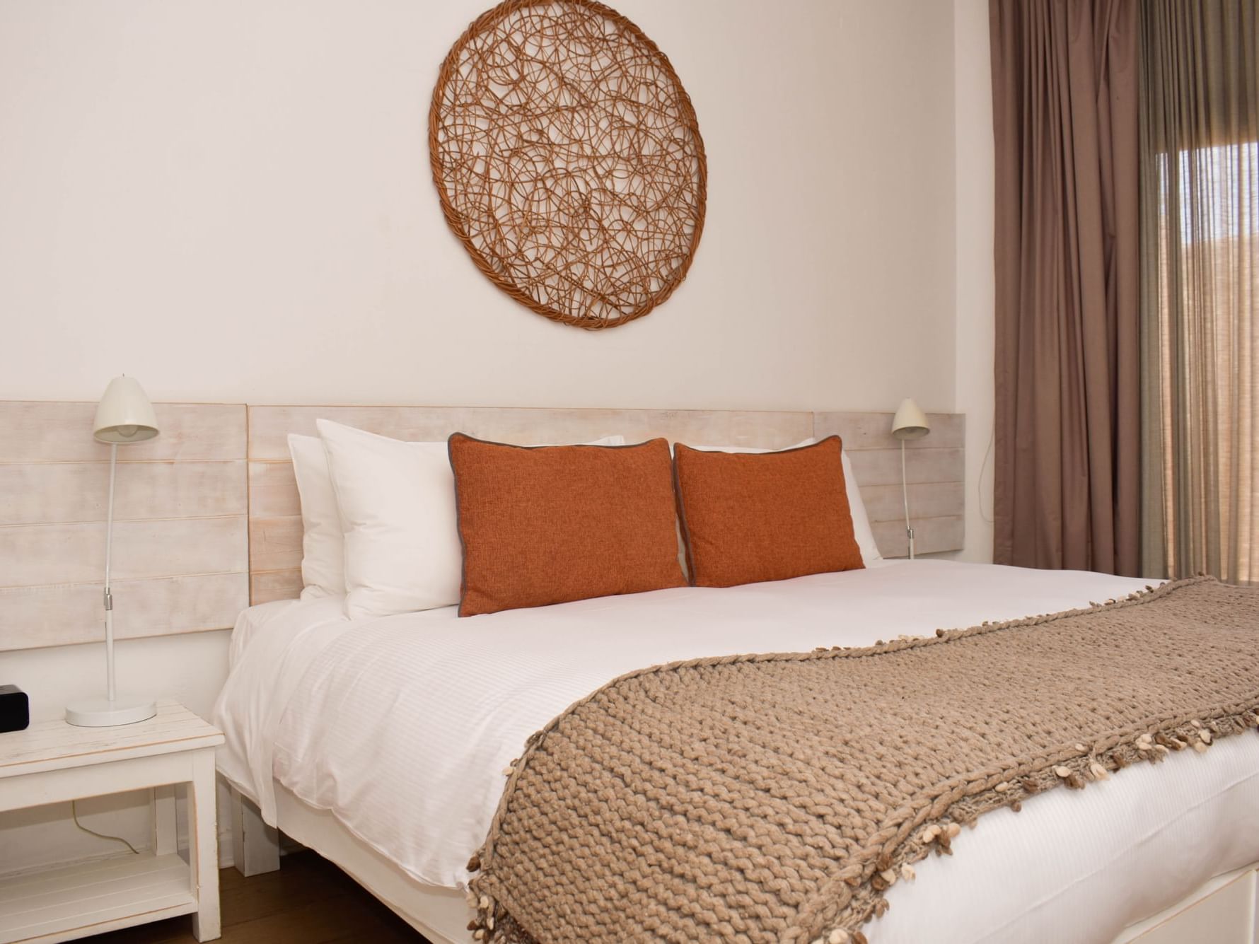 Deluxe room with queen size bed at NOI Casa Atacama hotel
