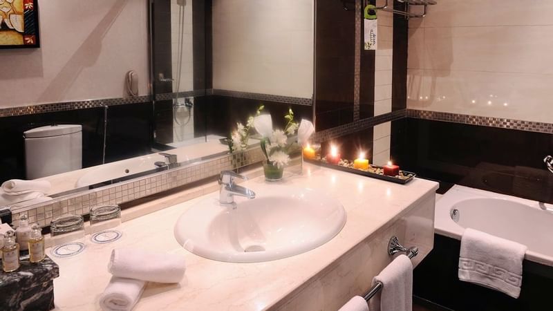 Bathroom amenities by the vanity in Deluxe Room at Al Hamra Palace by Warwick Riyadhd