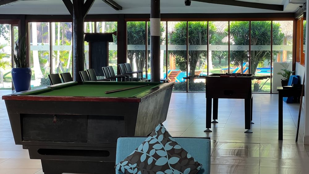Indoor recreation area with pool tables at Tambua Sands Beach Resort in Sigatoka.