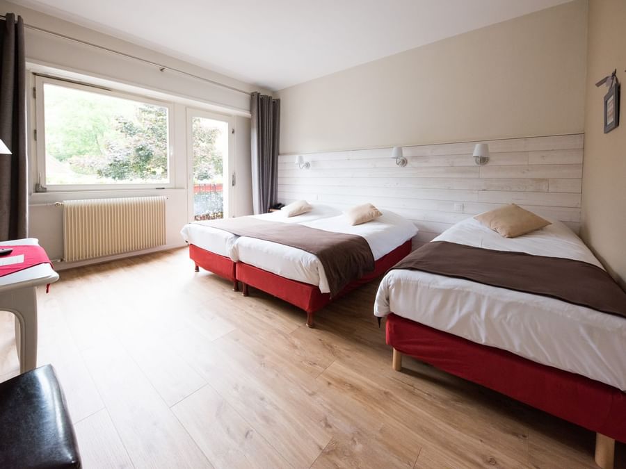 Double bed with extra bed in Chambre Familiale at Le Kastelberg