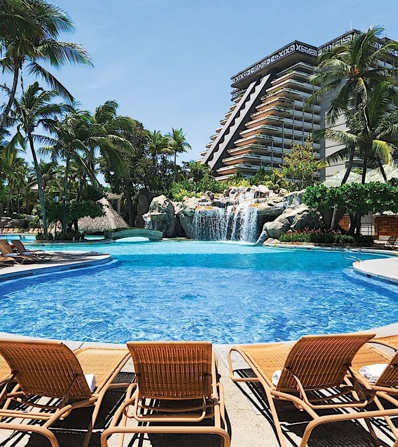 Exterior view and the pool area at Princess Mundo Imperial