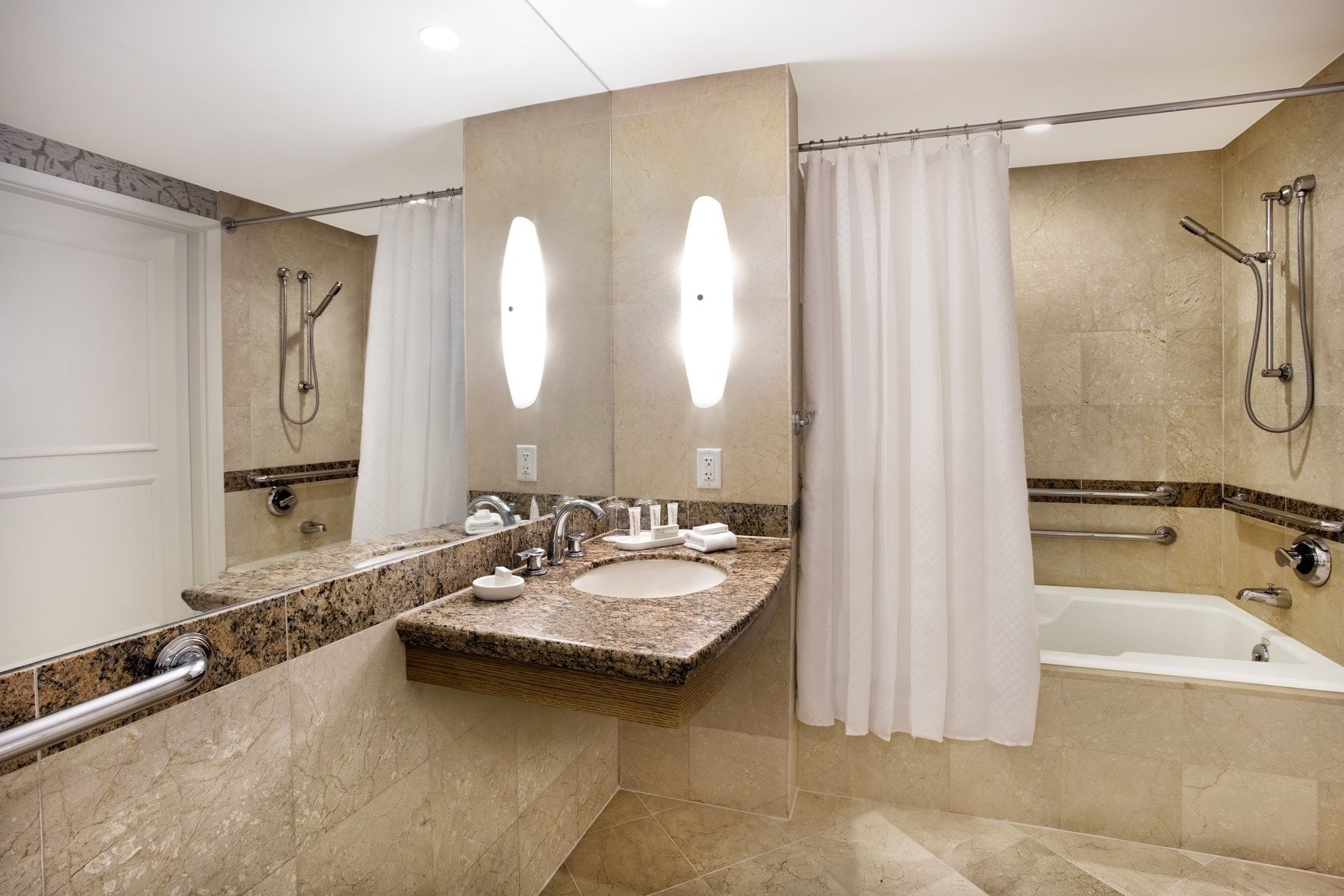 Oceanfront view full bathroom with a tub at The Diplomat Resort