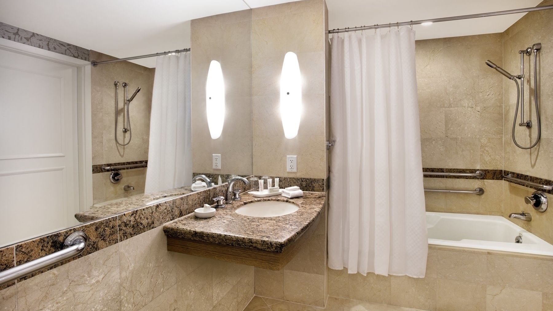 Bathroom vanity & tub of Intracoastal View suite at The Diplomat Resort