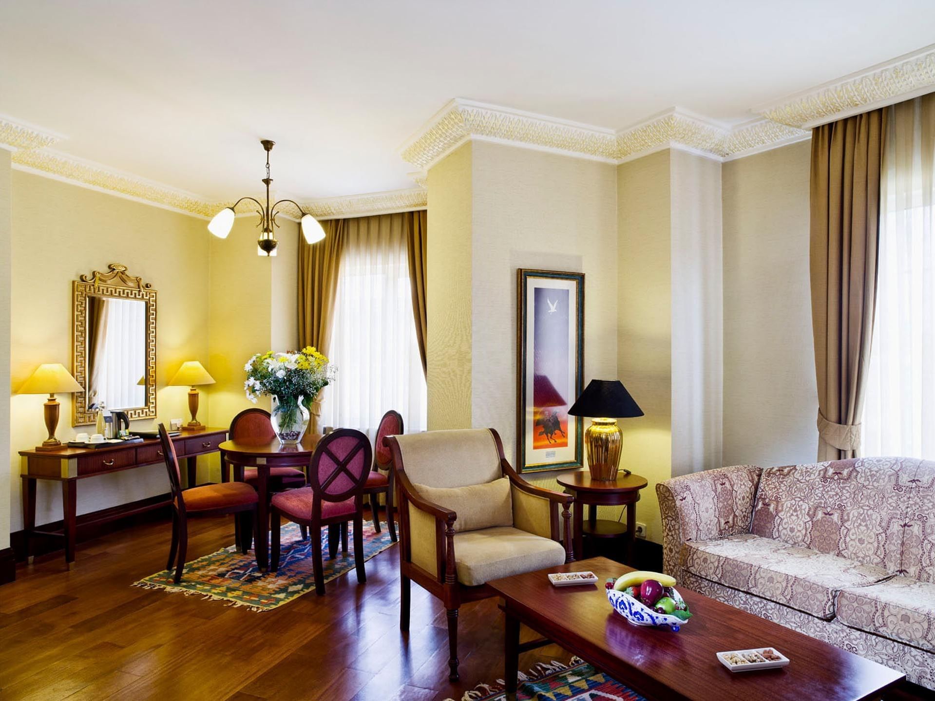 Luxurious Sultanahmet Escape: Eresin Junior Suite. King bed, spa bath, separate living area, Blue Mosque nearby.