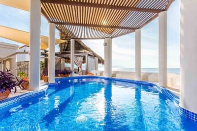 Swimming pool with ocean view at Buenaventura Grand Hotel
