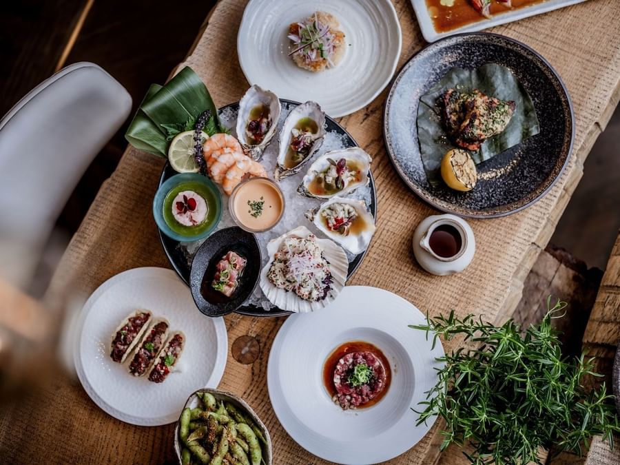 'Seafood spread with oysters, shrimp, sashimi, and edamame at The May Fair Hotel