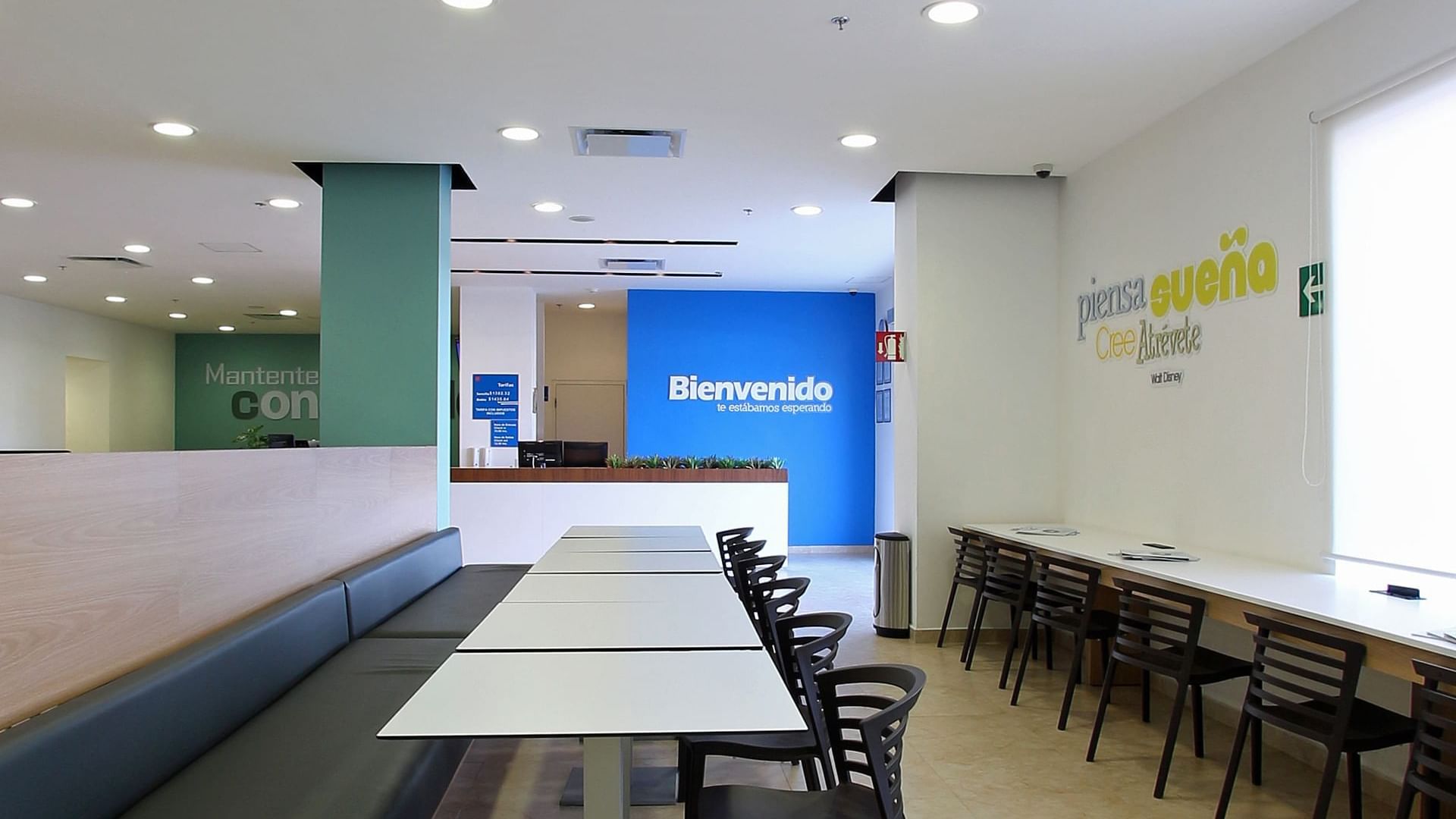 Dining area by the front desk at One Querétaro Centro Sur