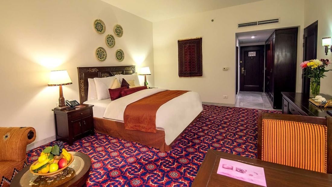 Deluxe Room with 1 king bed and couch at Dushanbe Serena Hotel