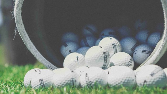 Closeup of golf balls in Golf ground near The Original Hotels
