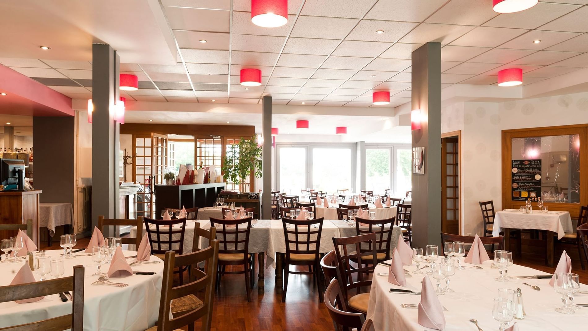 Interior of the Le Cheval Rouge Restaurant at Originals Hotels