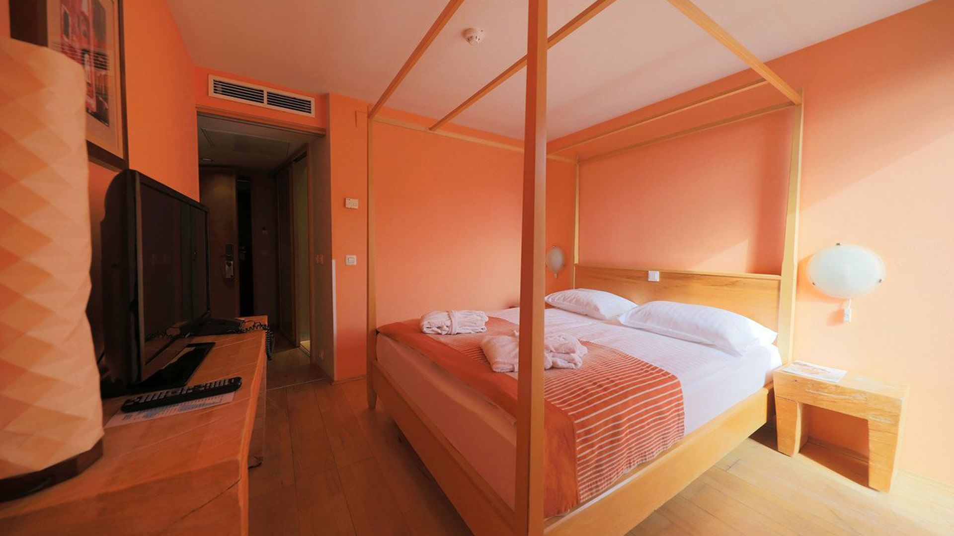 Large bed, Standard Family Room at Falkensteiner Hotels