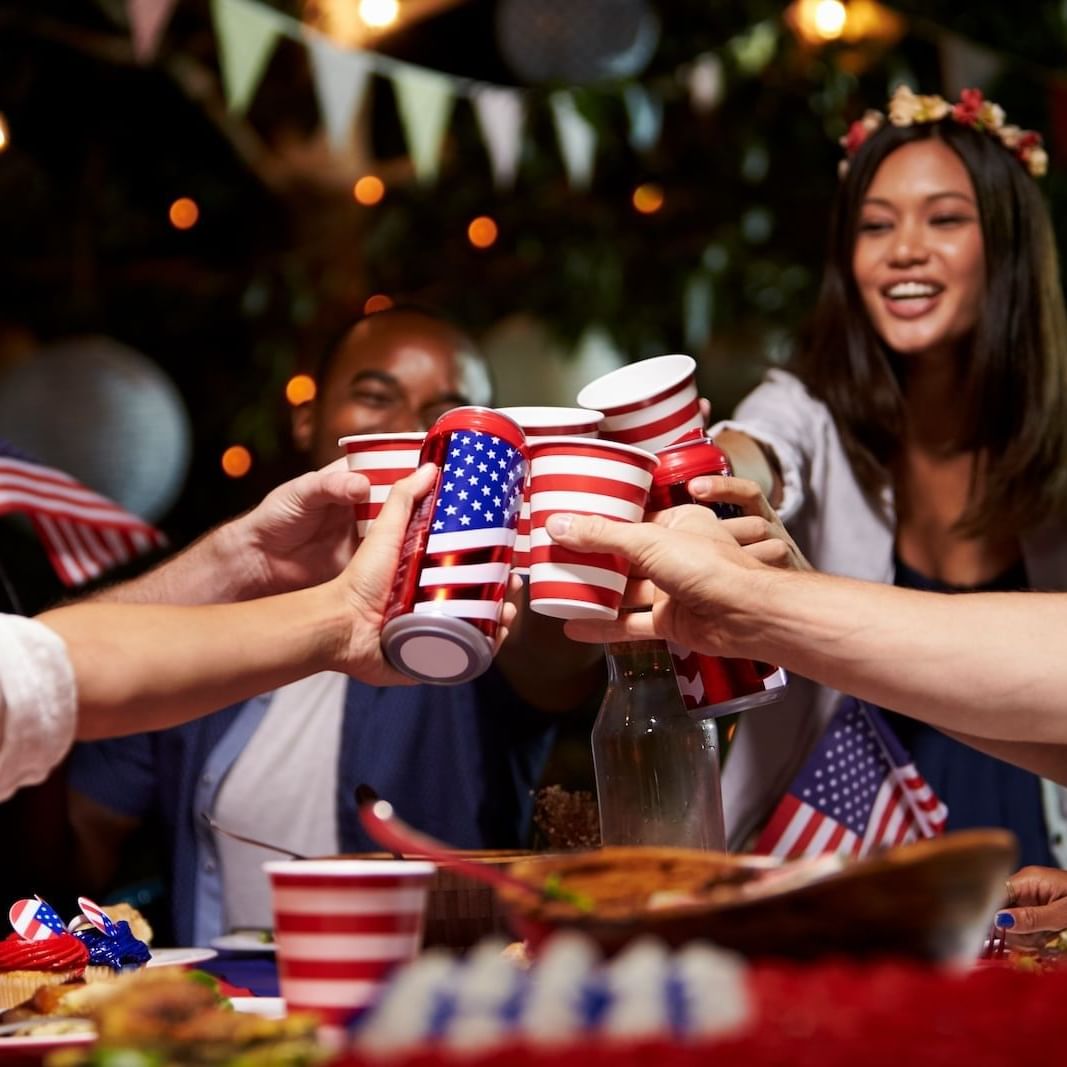 Friends cheers with patriotic cups