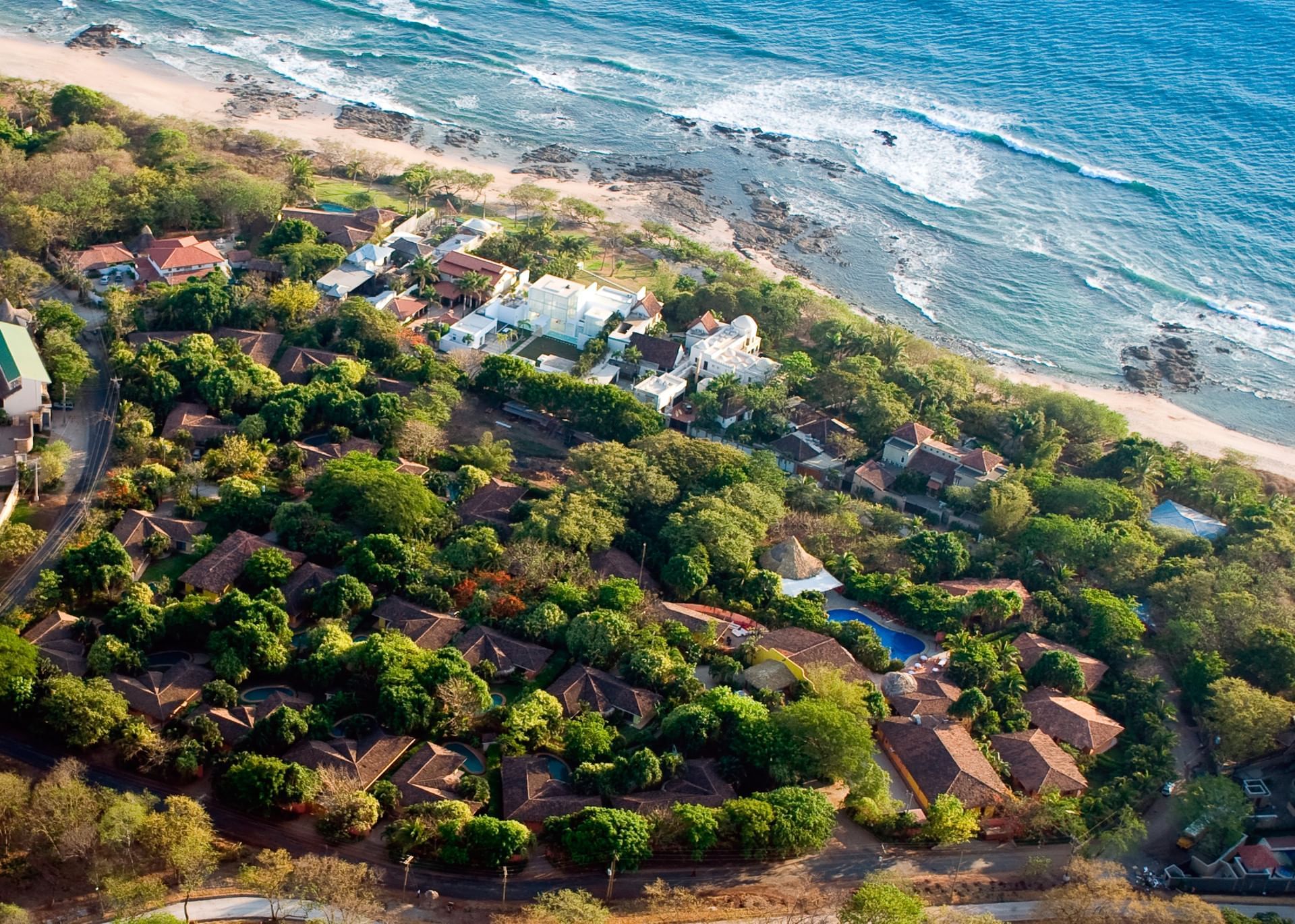 Distant view of the hotel & beach at Cala Luna Boutique Hotel