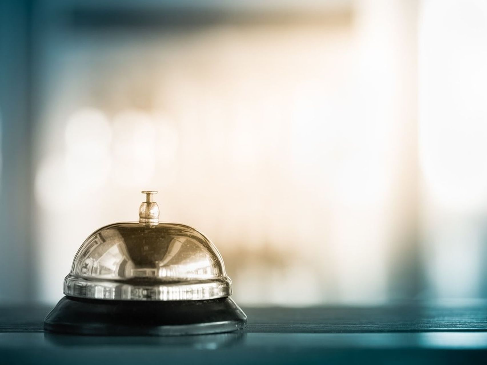 Closeup of a service bell on the front desk at Hotel Charleston