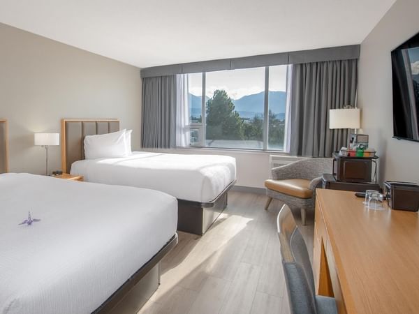 Two queens with pond view room at Coast Chilliwack Hotel by APA.