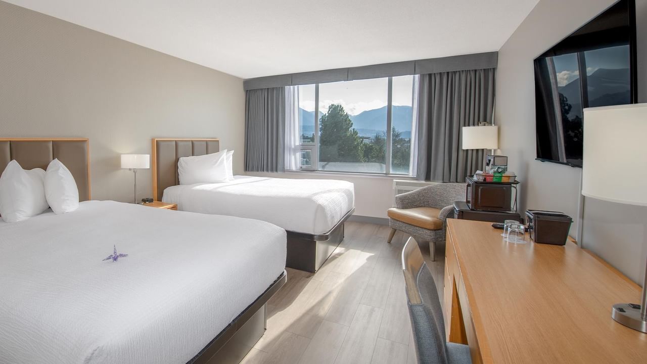 Two queens with pond view room at Coast Chilliwack Hotel by APA.