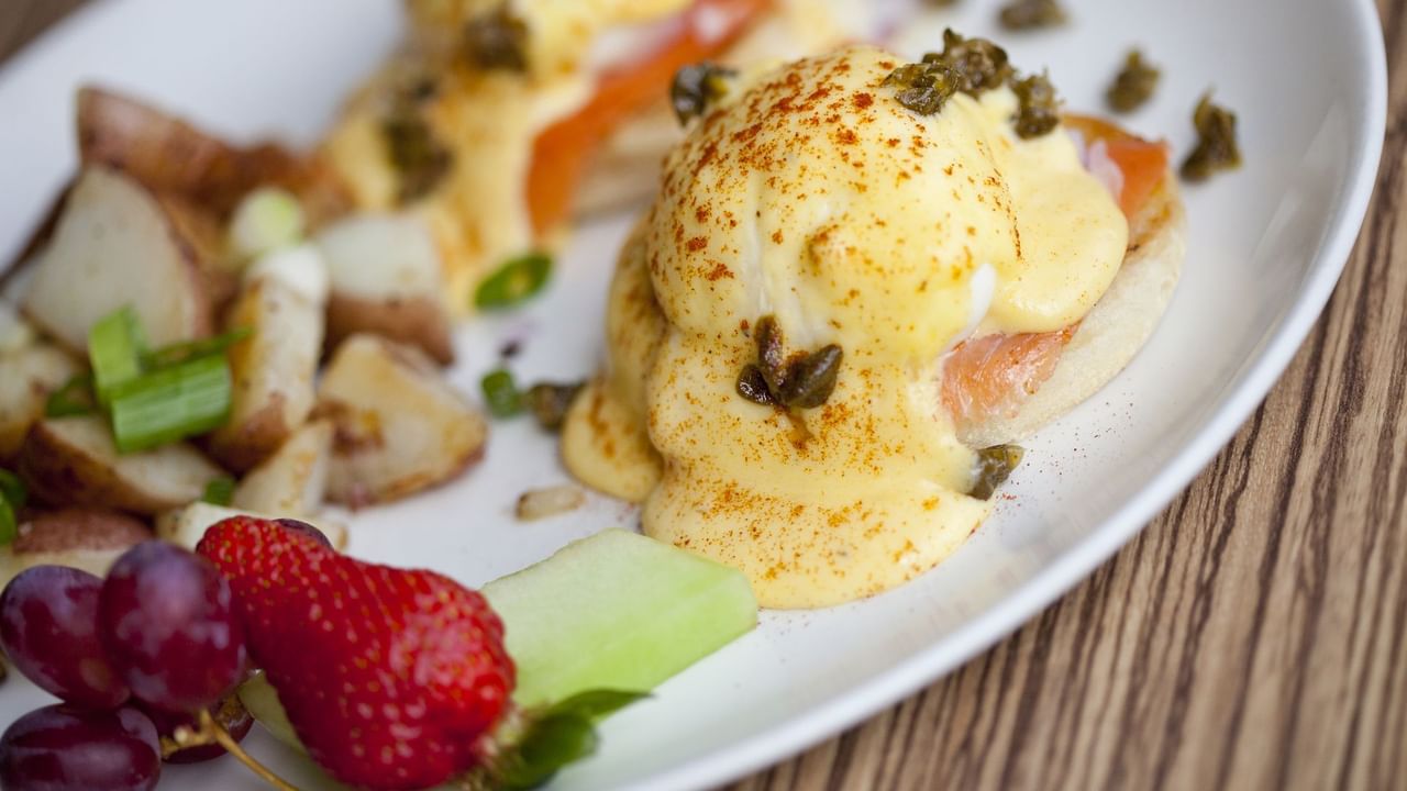 poached eggs, potatoes and fruit