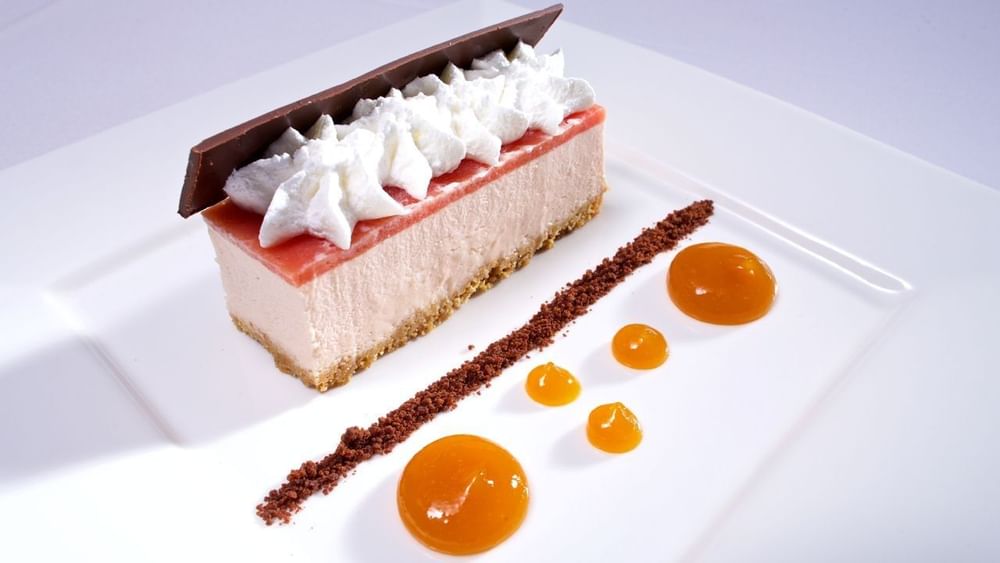 Cheesecake with fruit gel under whipped cream in Abbiocco at Warwick Paradise Island Bahamas
