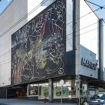 The exterior view of Manor Shopping Centre near Warwick Geneva