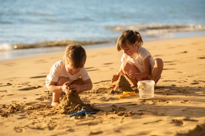 Children playing by the sea near The Imperial Hotel Blackpool