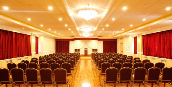 Theater set-up for an event in Solarium Hall at Honor’s Haven Retreat