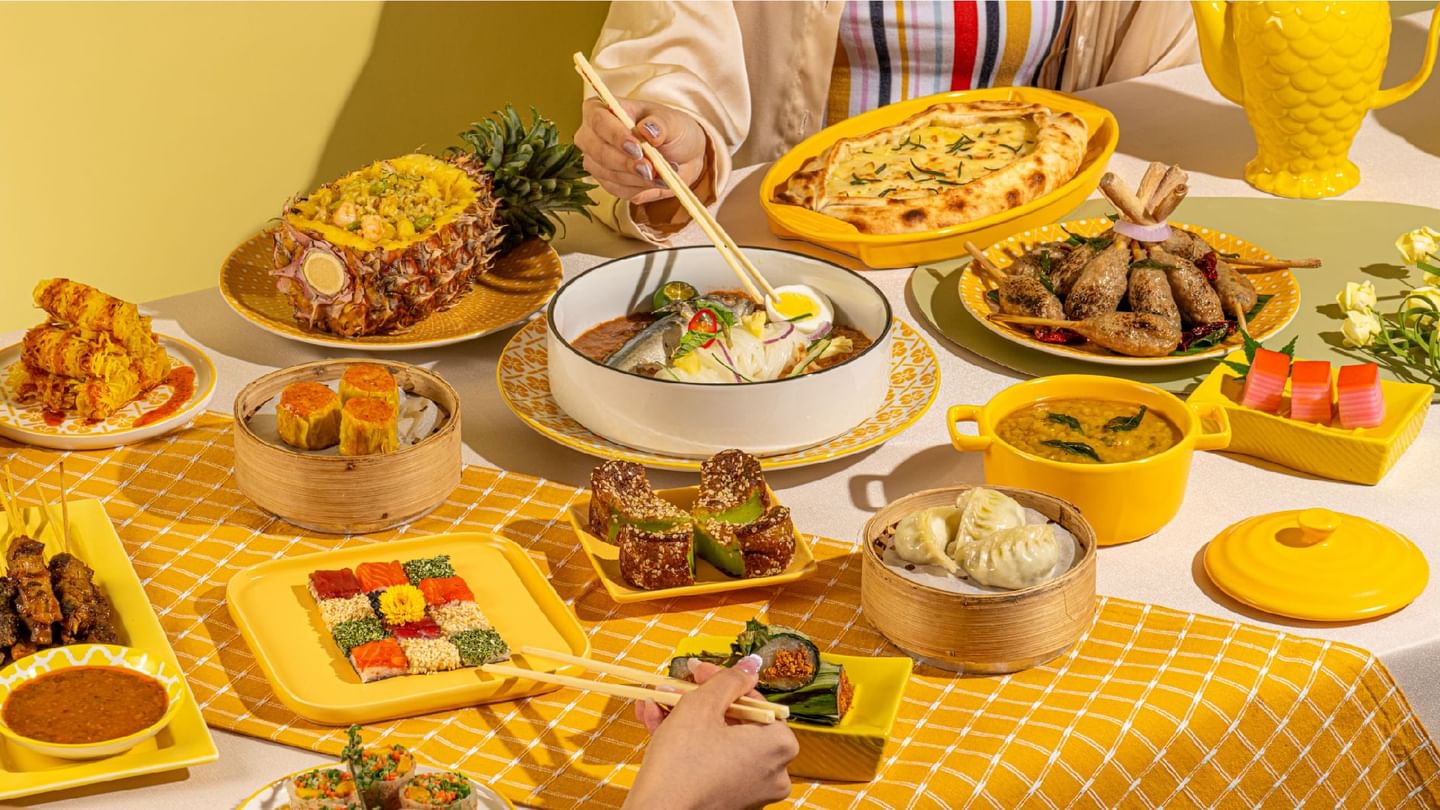 Various dishes served on a table in the Pan-Asian Buffet at Sunway Resort