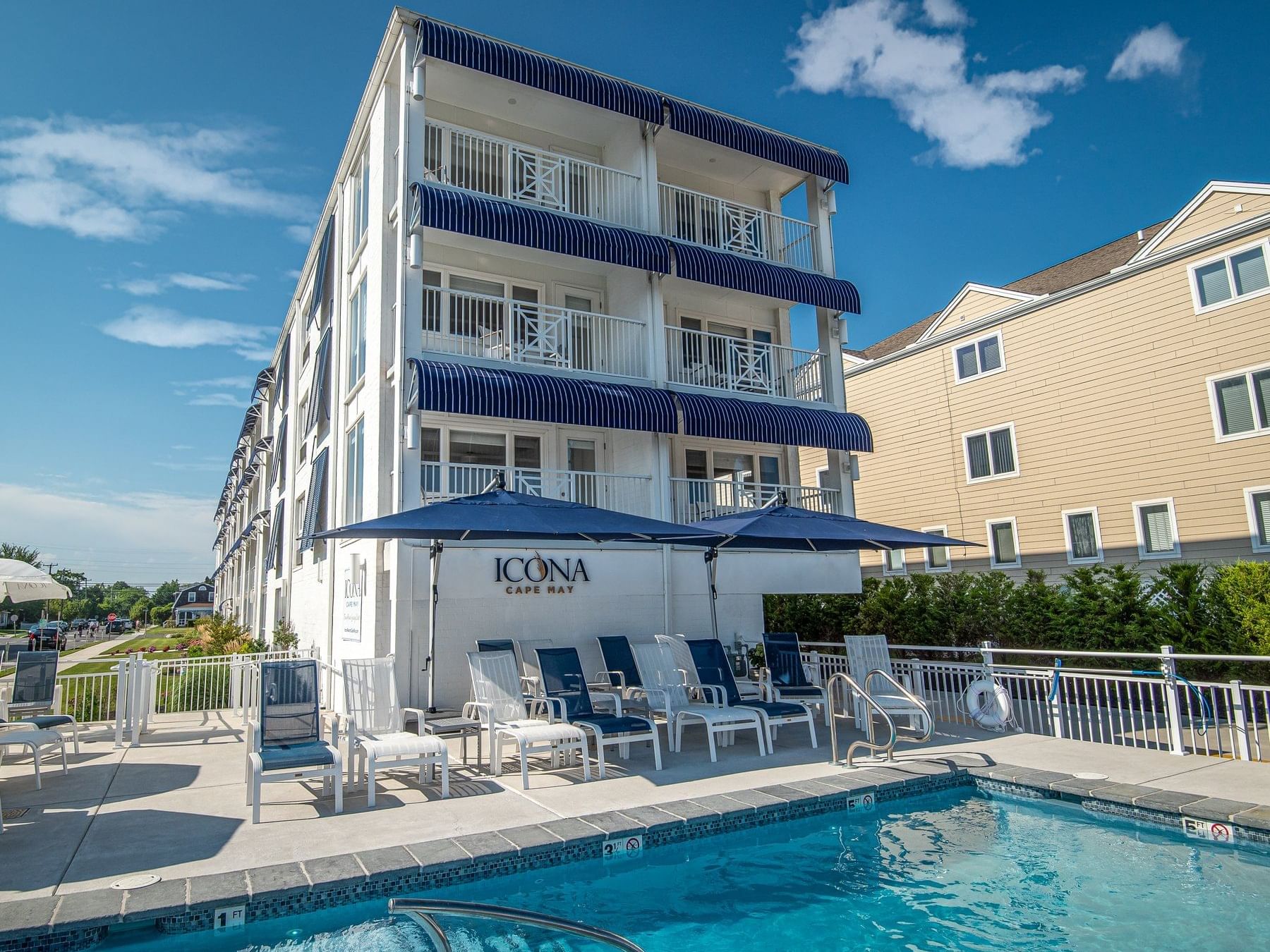 The exterior view of the ICONA Cape May outdoor pool area
