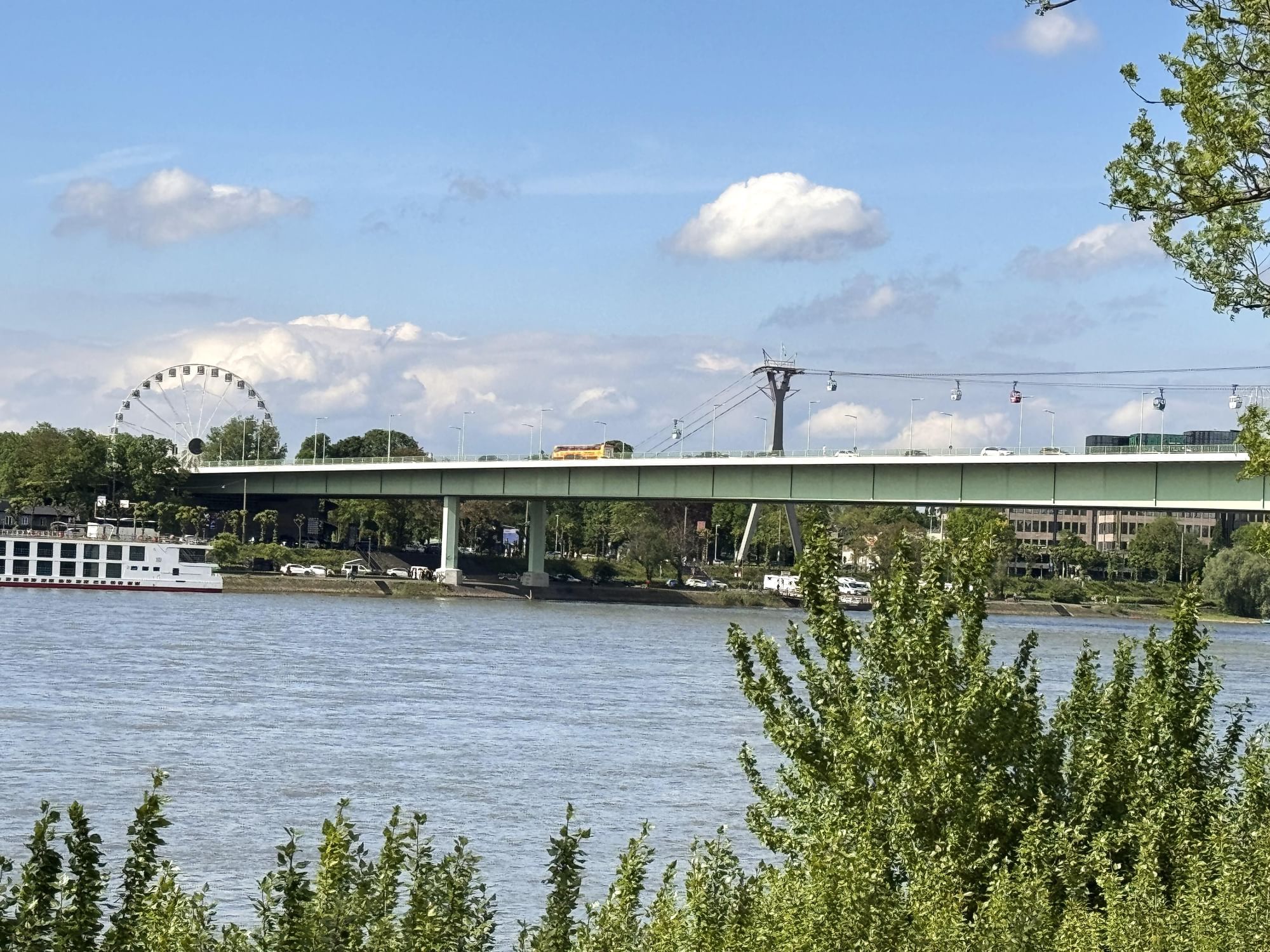 Zoobrücke Bridge over Rhein River with cable cars near Classic Hotel Harmonie