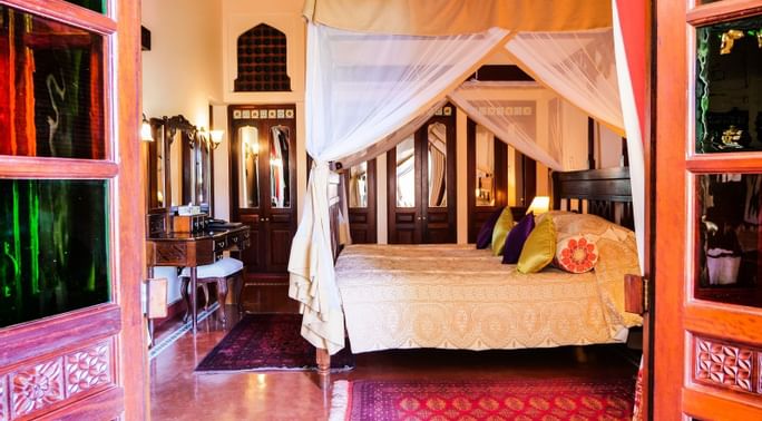 Interior of Executive Suite bedroom at Zanzibar Serena Hotel